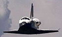 shuttle gliding into a landing